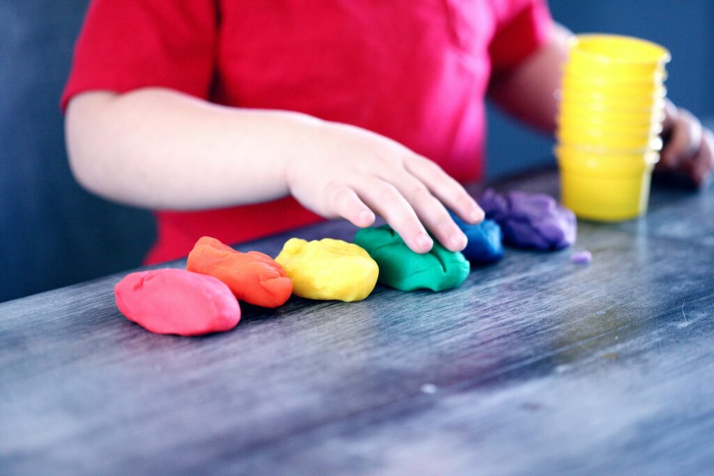 kids playing with playdough